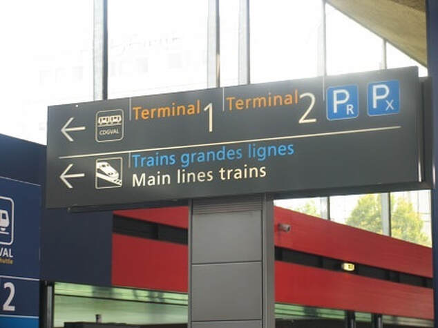 Sign at CDG 1 train station for direction to Terminal 1
