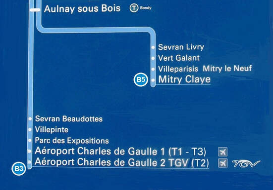 Direction sign showing RER arrival stations at CDG Airport  