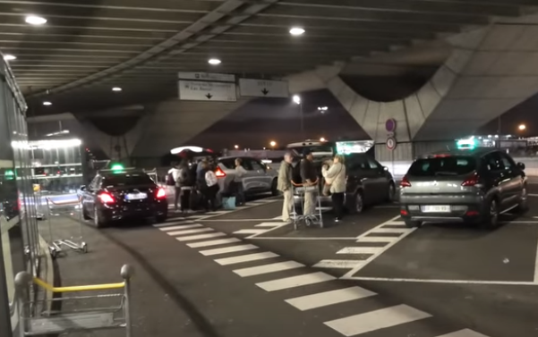 Loading luggage into Paris taxis at CDG airport